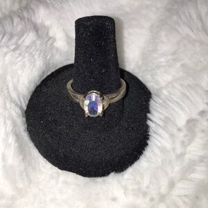 Genuine iridescent crystal set in sterling silver whale tail bezel ring